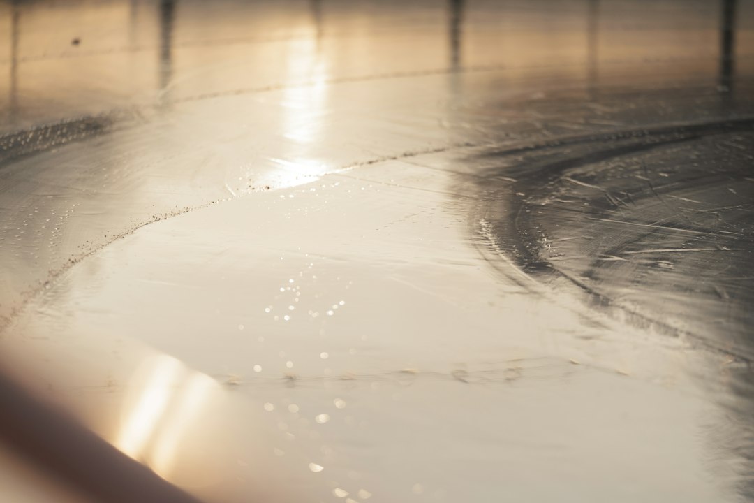 Sunlight reflecting on a wet, shiny floor in Allen, TX